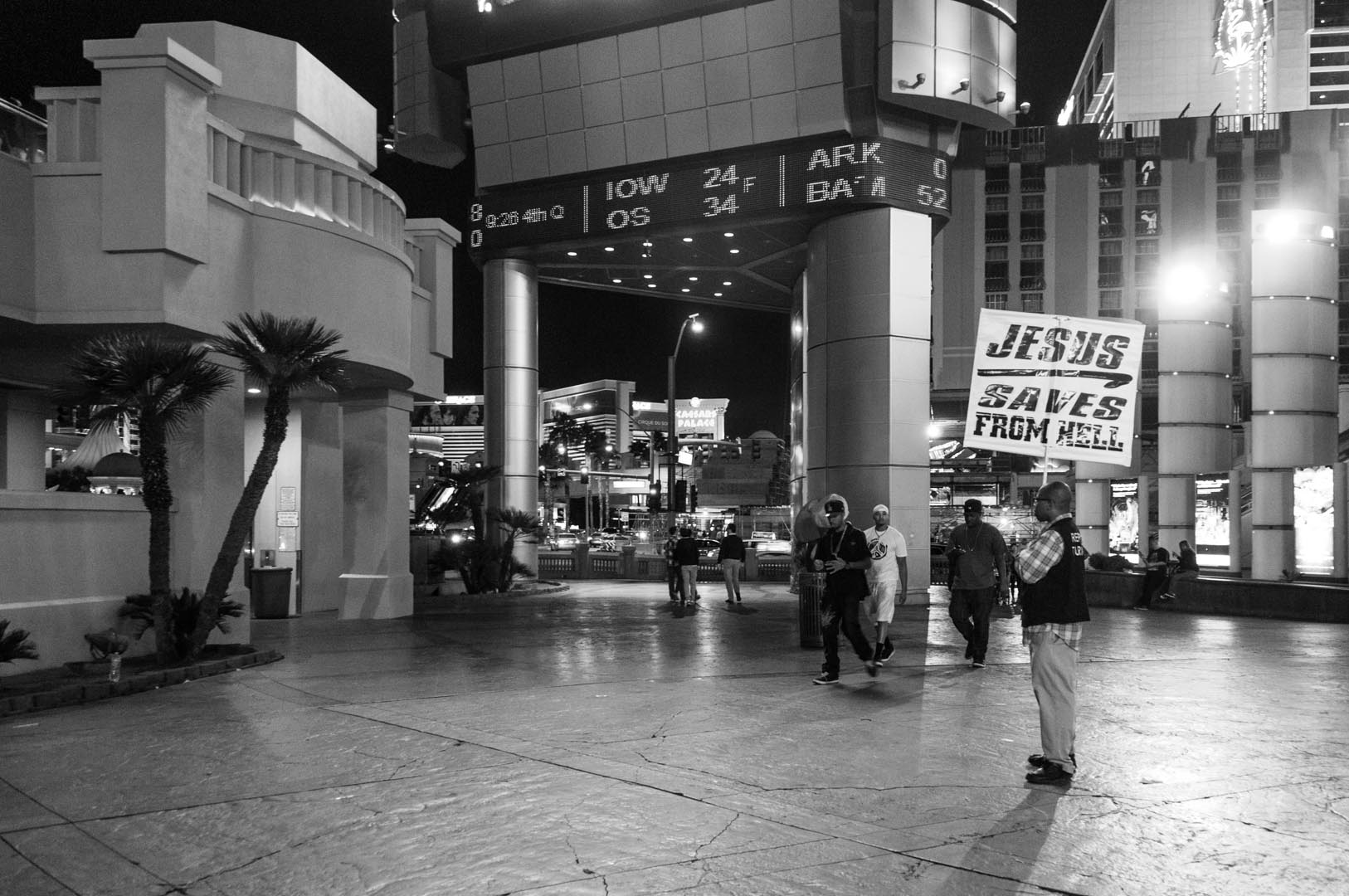 sin city jesus saves from hell b&w black white las vegas strip religion religious message messenger.jpg