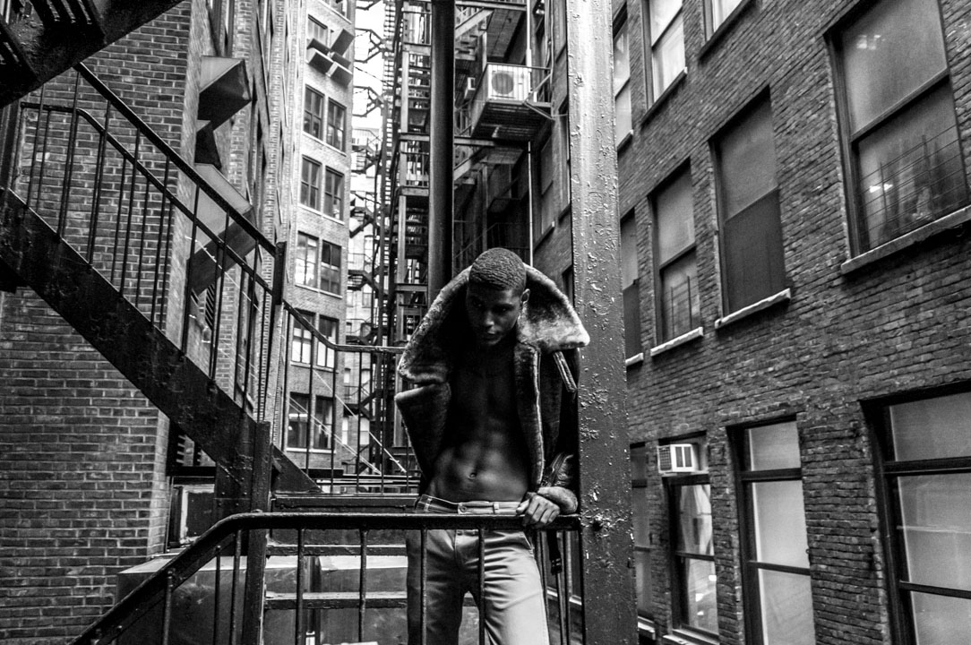 mystery man black afro african american nyc manhattan b&w black and white stairway back alley winter night sunset dusk fall model shoot photoshoot fashion vogue unvogue.jpg