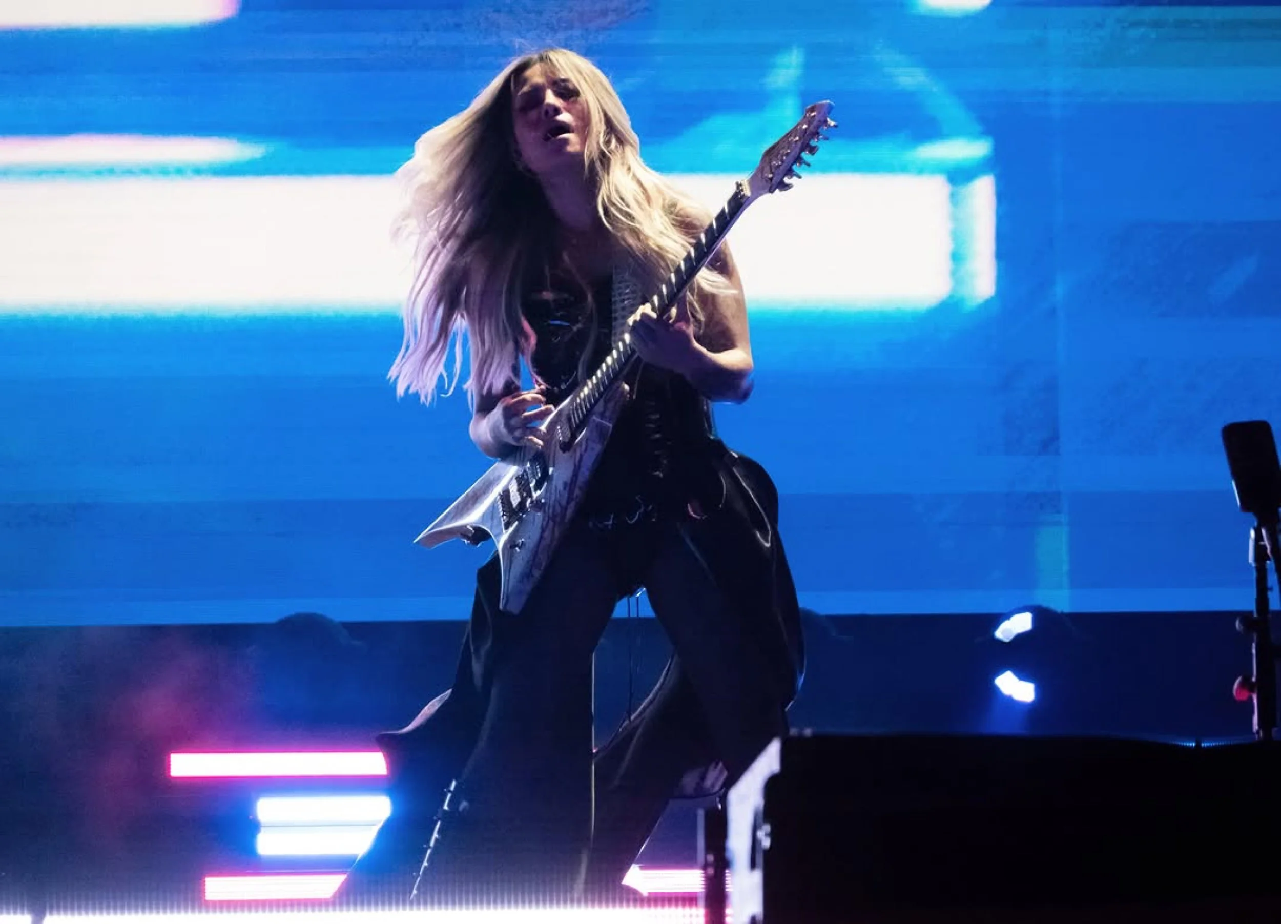 Smashing Pumpkins guitarist Kiki Wong playing Sully Guitars Concorde at Lollapalooza 2026 Photo by Gabby Mansilla