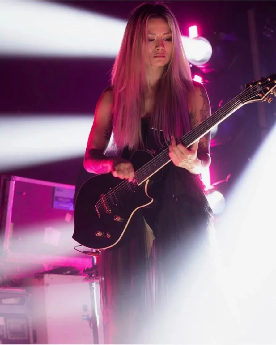 Smashing Pumpkins guitarist Kiki Wong playing a 71 Trella 24 by Sully Guitars at the Riviera Theater in Chicago. Photo by Tyler Curtis