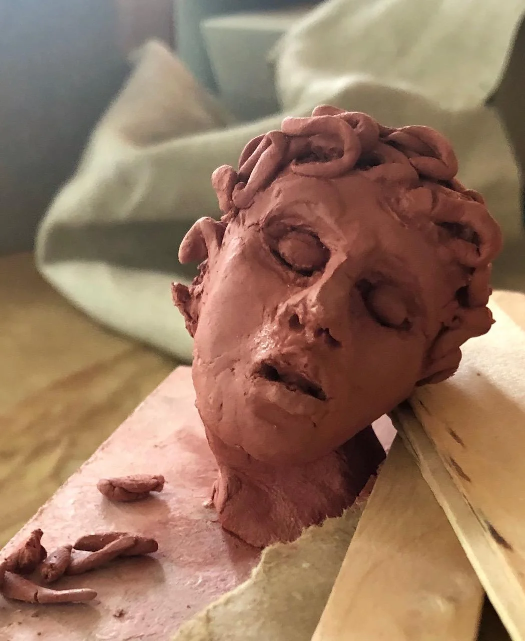 Artifact head_red clay_in process.jpg