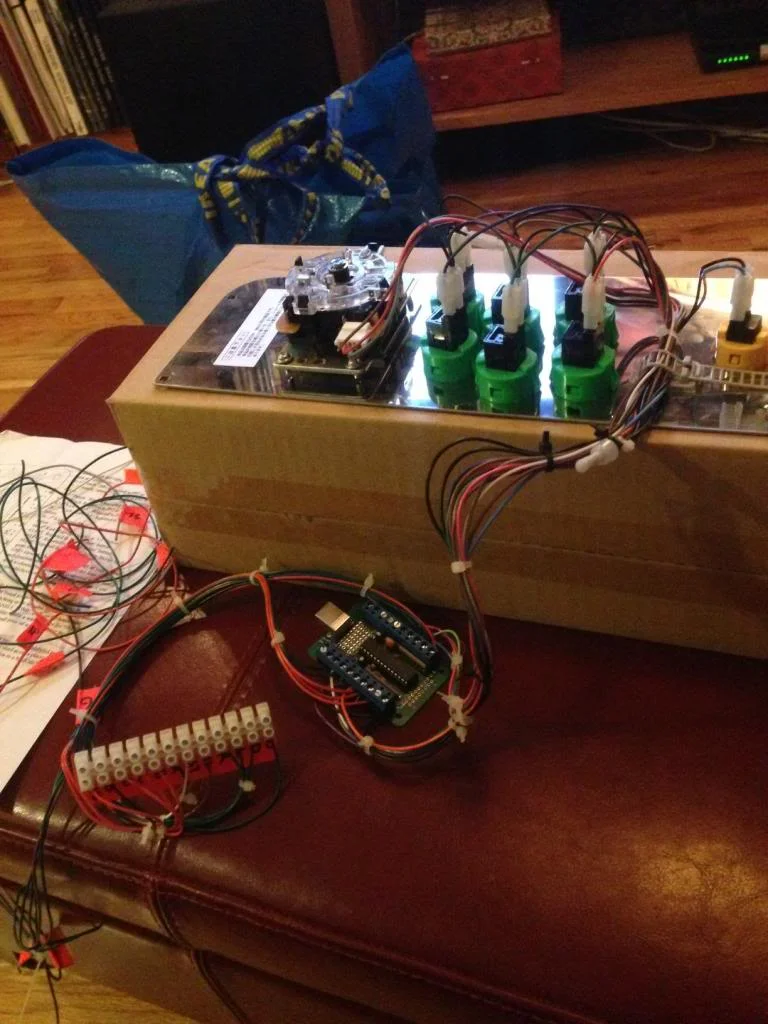 The little breakout box on the left is for the Neo Geo connection. 