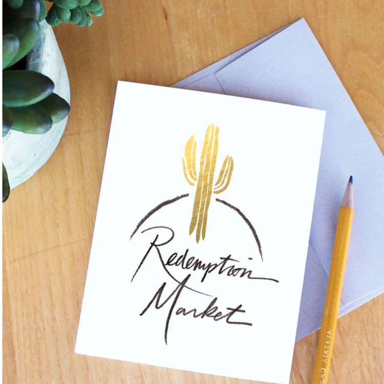 Redemption Market: Fair Trade Market Logo design featuring custom illustration, lettering, and foiled painting
