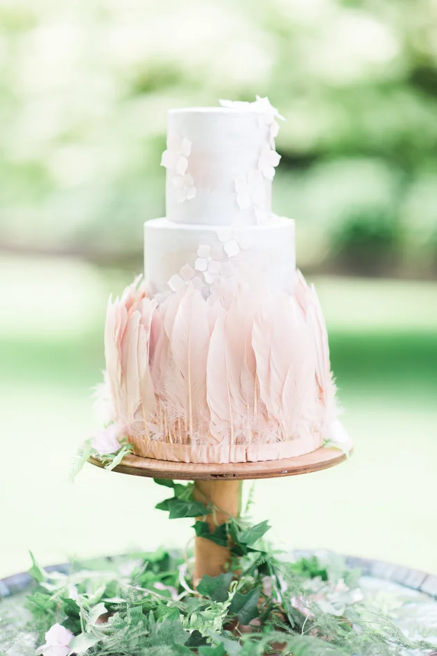 Feathers and flowers: blush pink is one of my favourite shades for weddings and this beautifully delicate 3 tiered cake by Little Bear Cakery is a perfect example of why. Image: Sanshine Photography