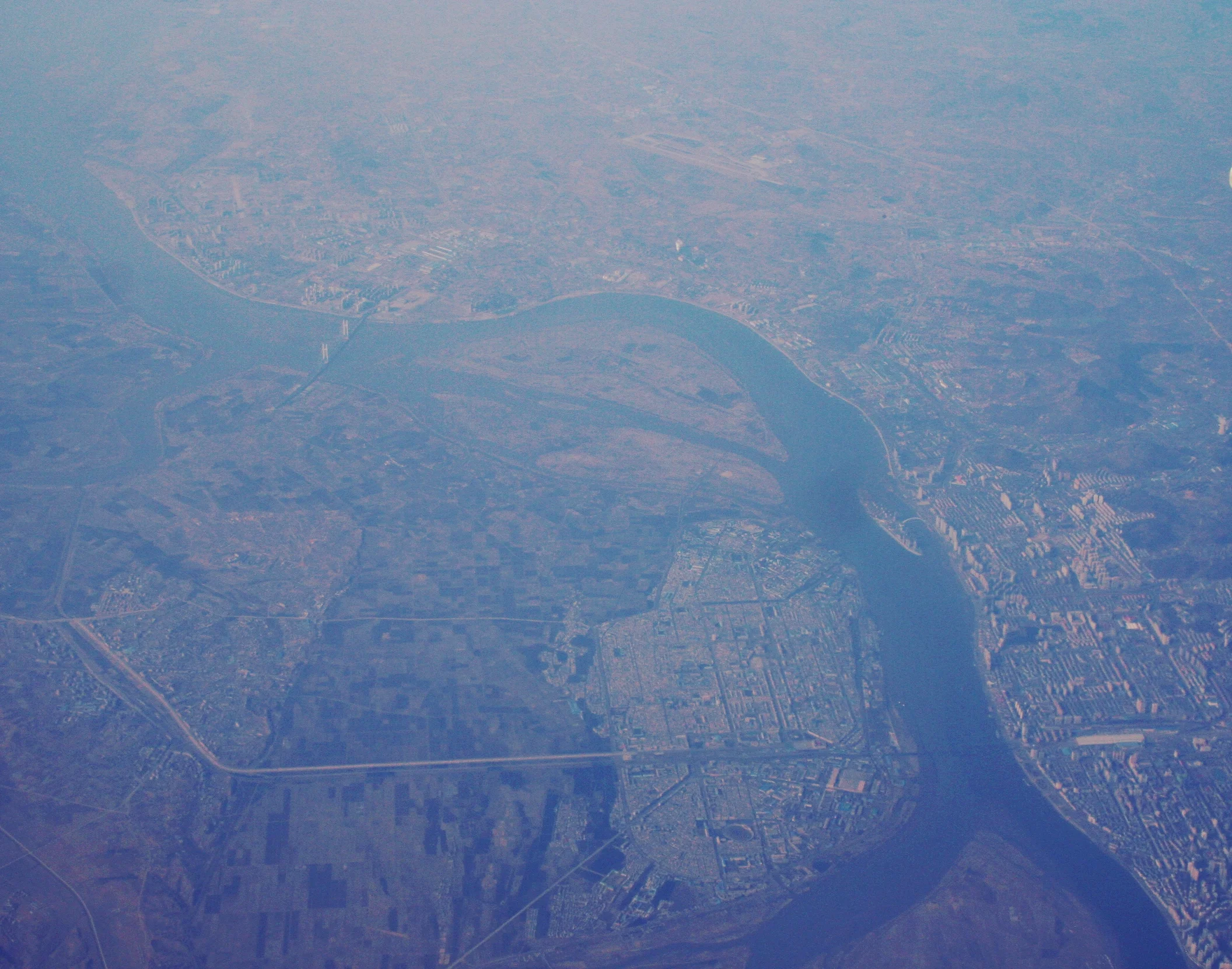Sinuiju and Dandong, from a comfy Air Koryo window seat.