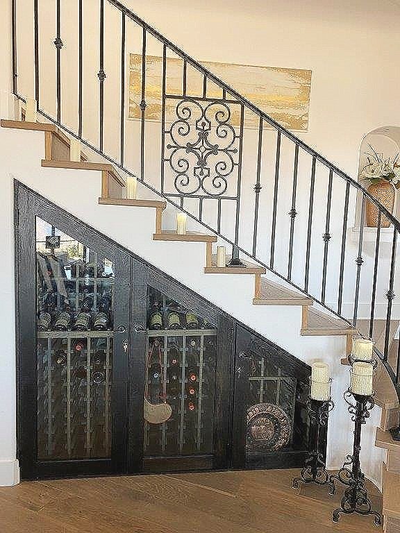 under stairs wine cabinet designed and built by Tempo Designs Gabriel McKeagney