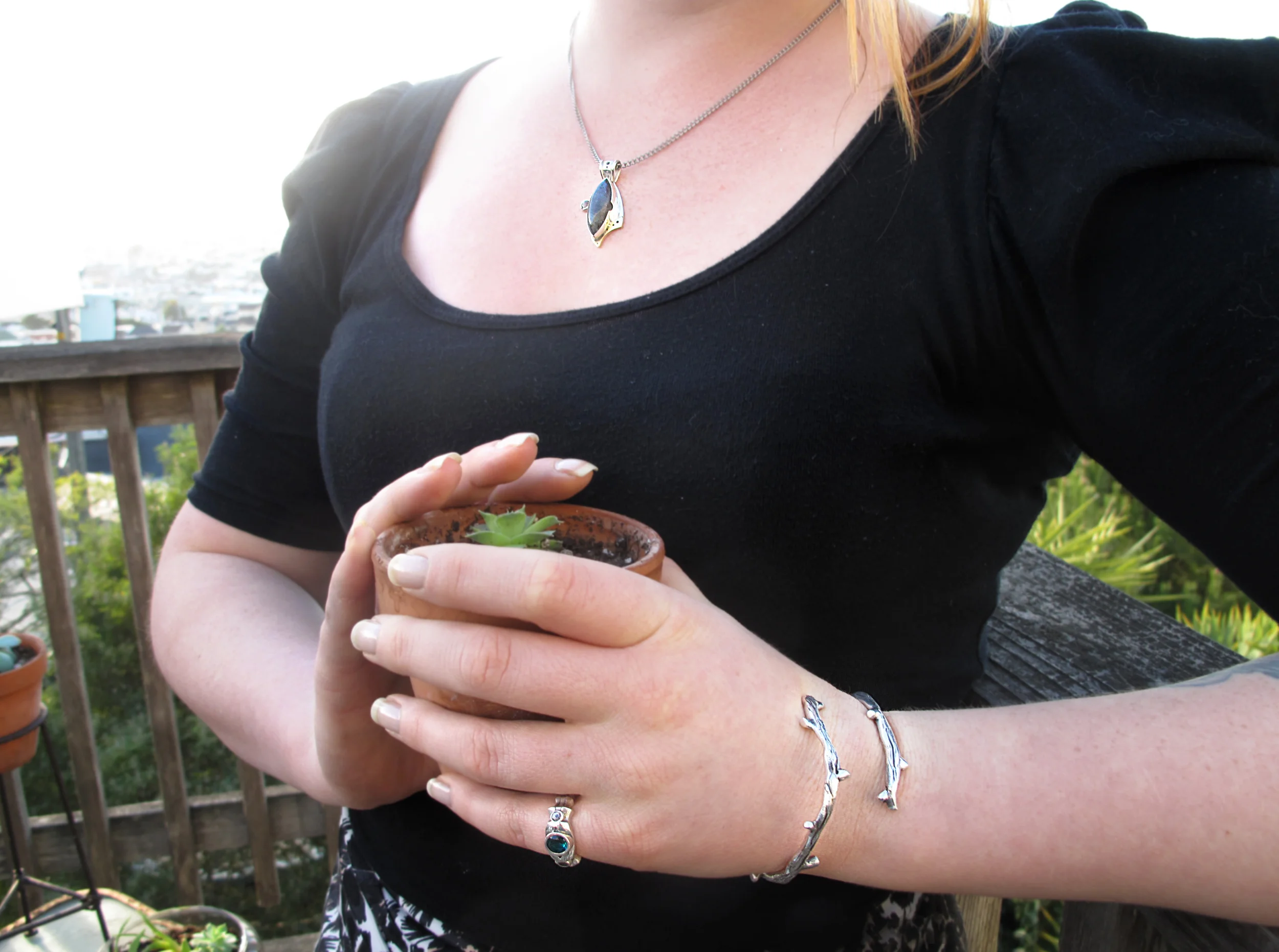 Labradorite Pendant, Ring, and cast sterling silver bracelet. Model: Hilda Salokorpi Photo: Nikki Nolan (thenikkinolan.com) 
