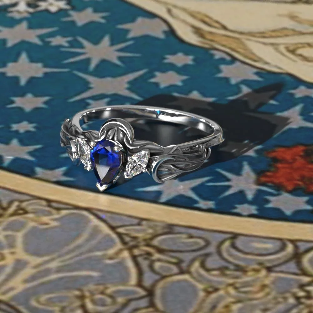 05-art-nouveau-sapphire-pear-ring-three-quarter.jpg