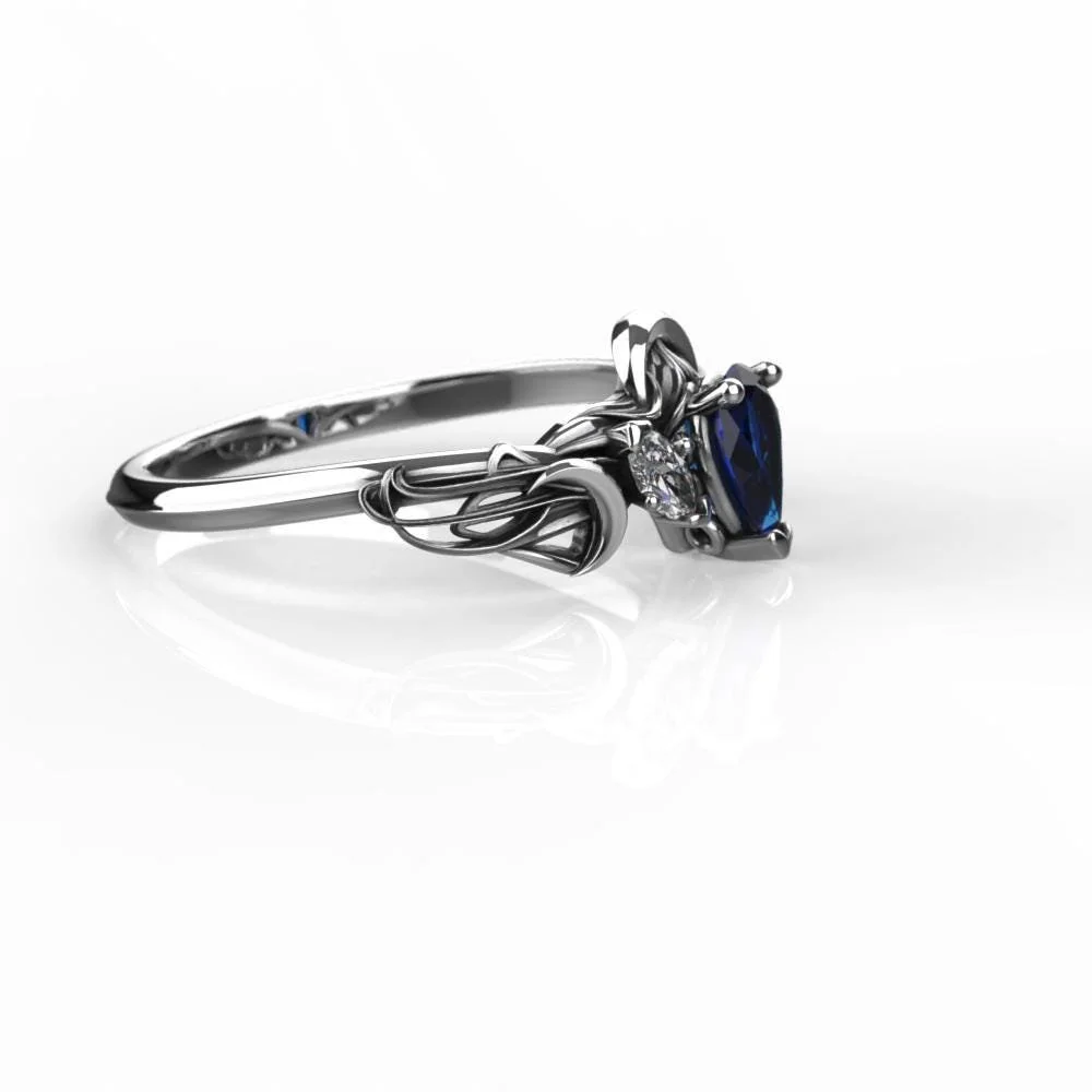 07-art-nouveau-sapphire-pear-ring-worn.jpg