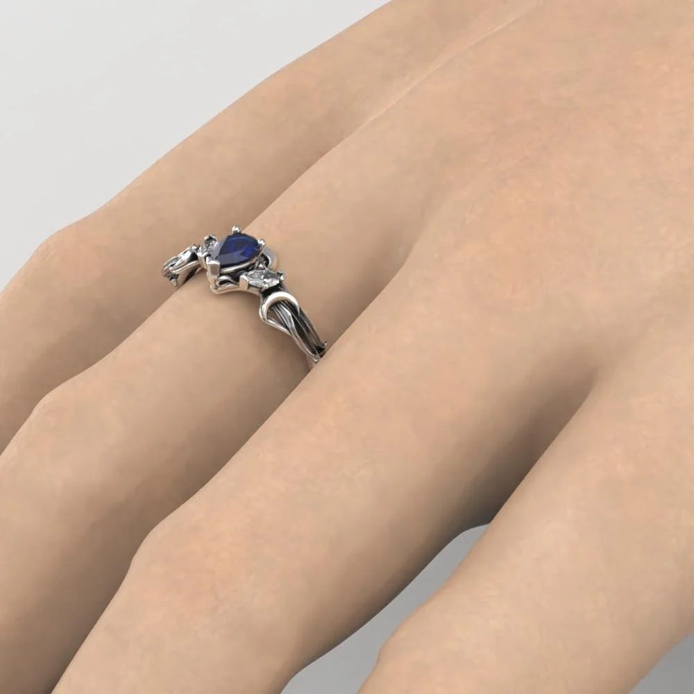 08-art-nouveau-sapphire-pear-ring-scale.jpg