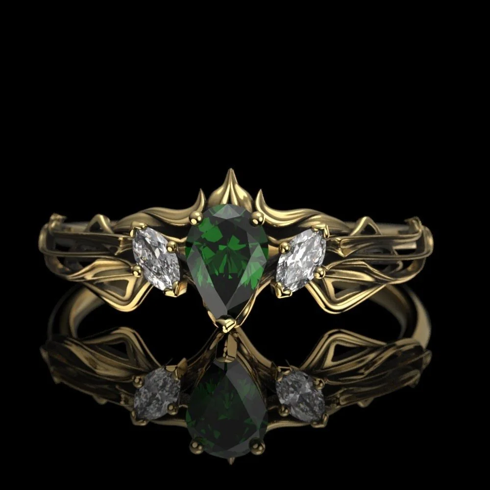 02-elven-emerald-engagement-ring-angle.jpg