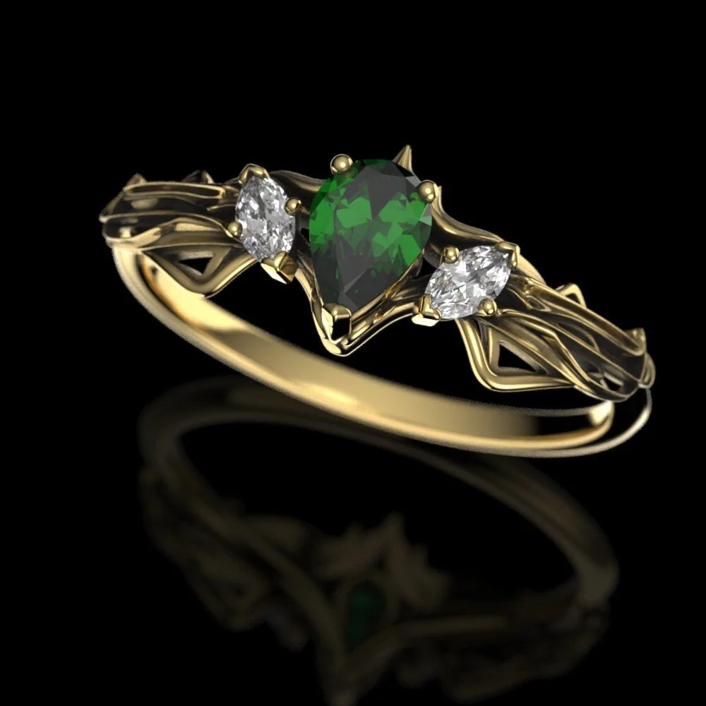 04-elven-emerald-engagement-ring-side.jpg