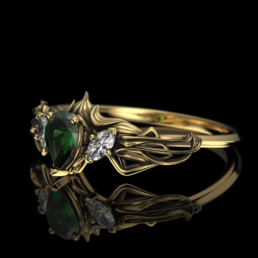 07-elven-emerald-engagement-ring-worn.jpg