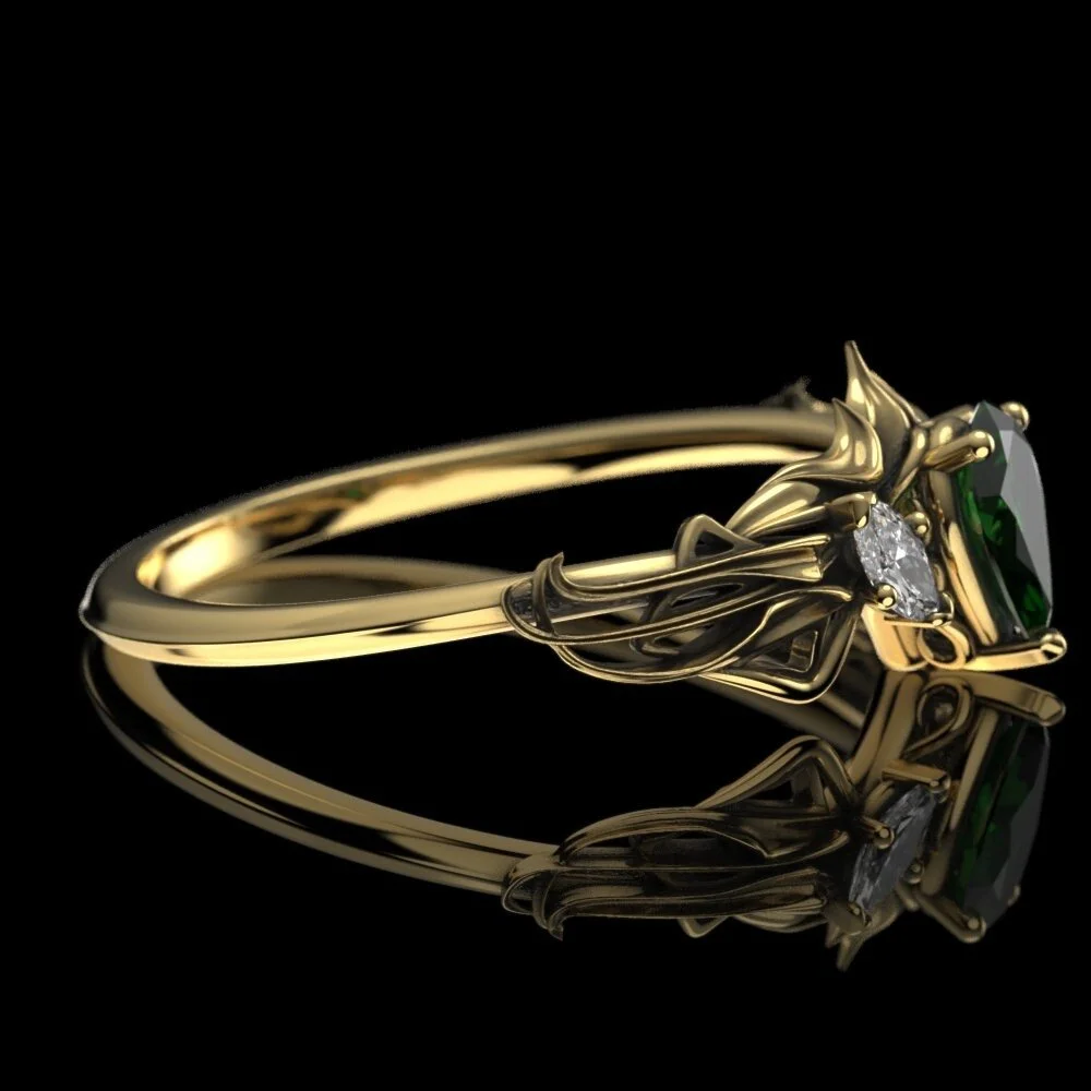 08-elven-emerald-engagement-ring-close-up.jpg