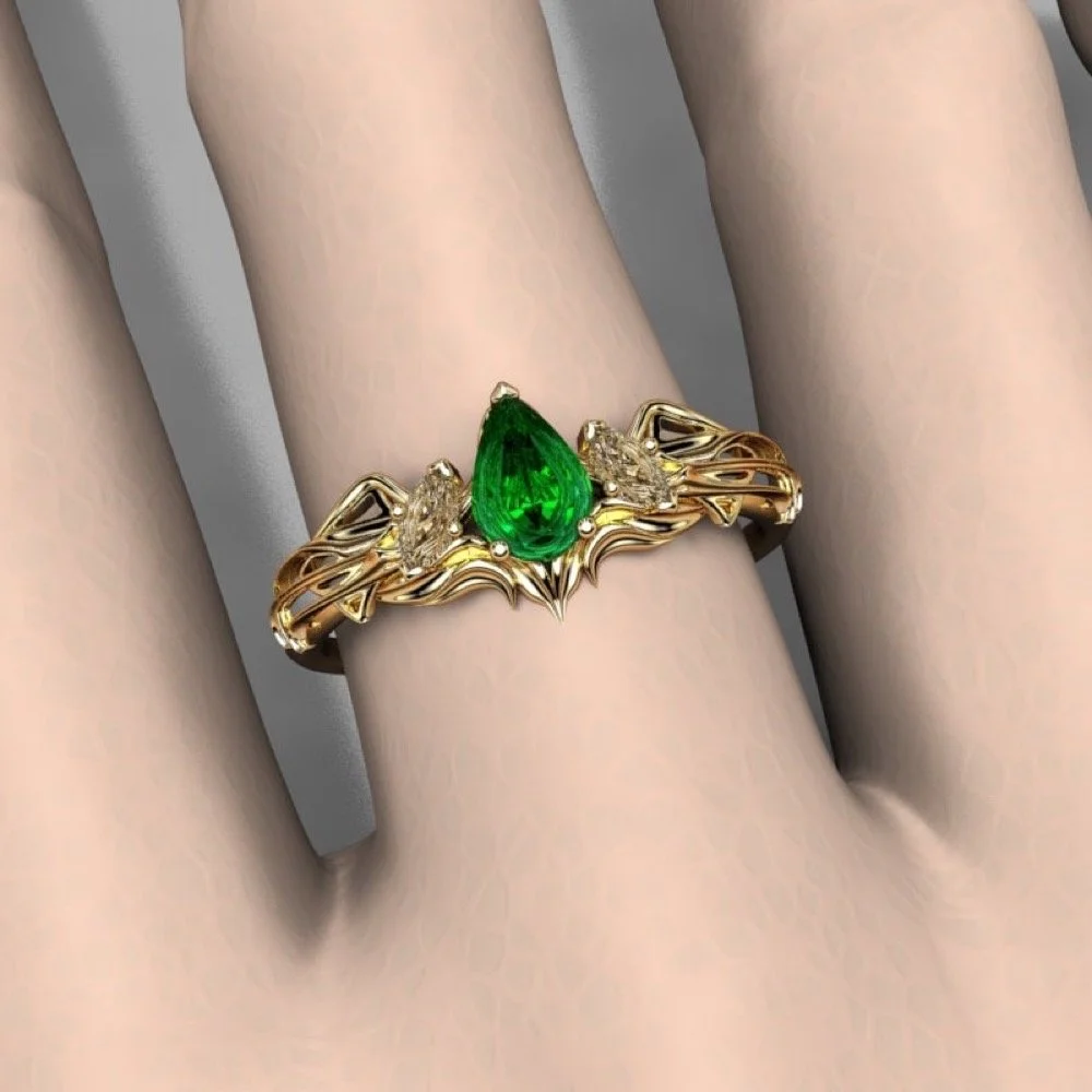 10-elven-emerald-engagement-ring-scale.jpg