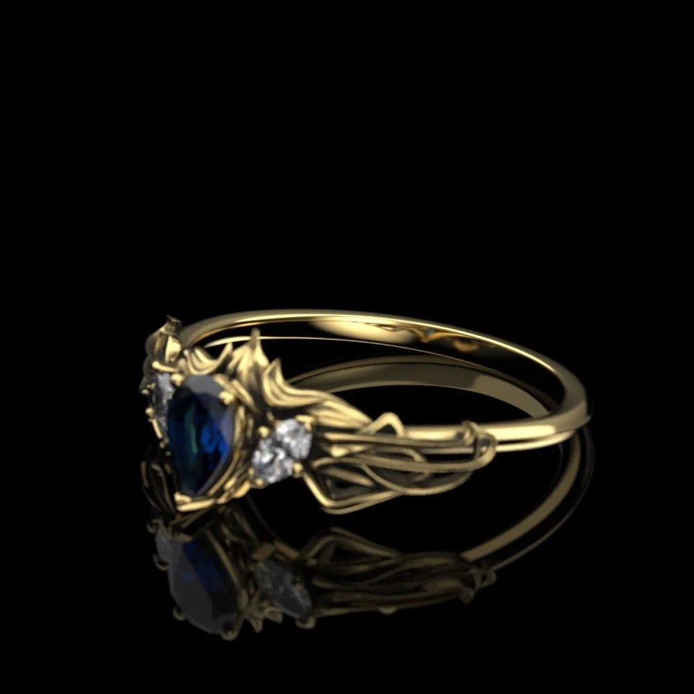 05-elvish-sapphire-engagement-ring-three-quarter.jpg