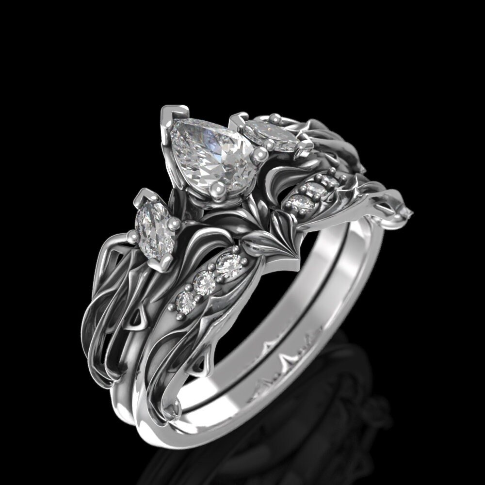 03-elvish-moissanite-ring-set-detail.jpg