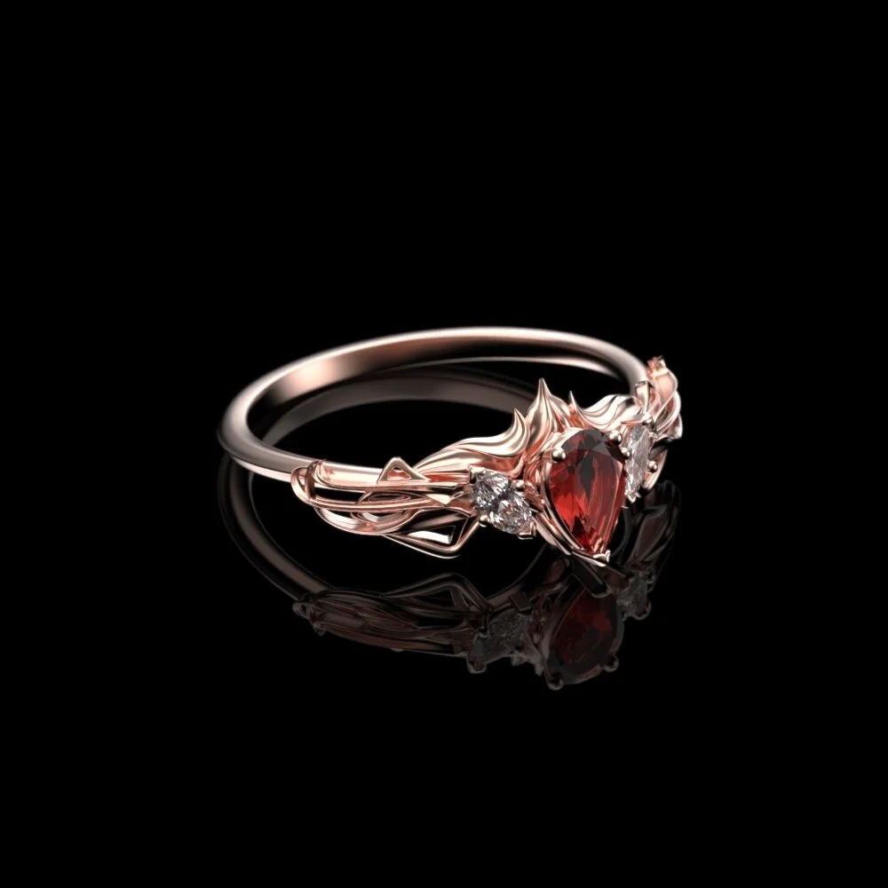 02-elvish-rose-gold-garnet-ring-angle.jpg
