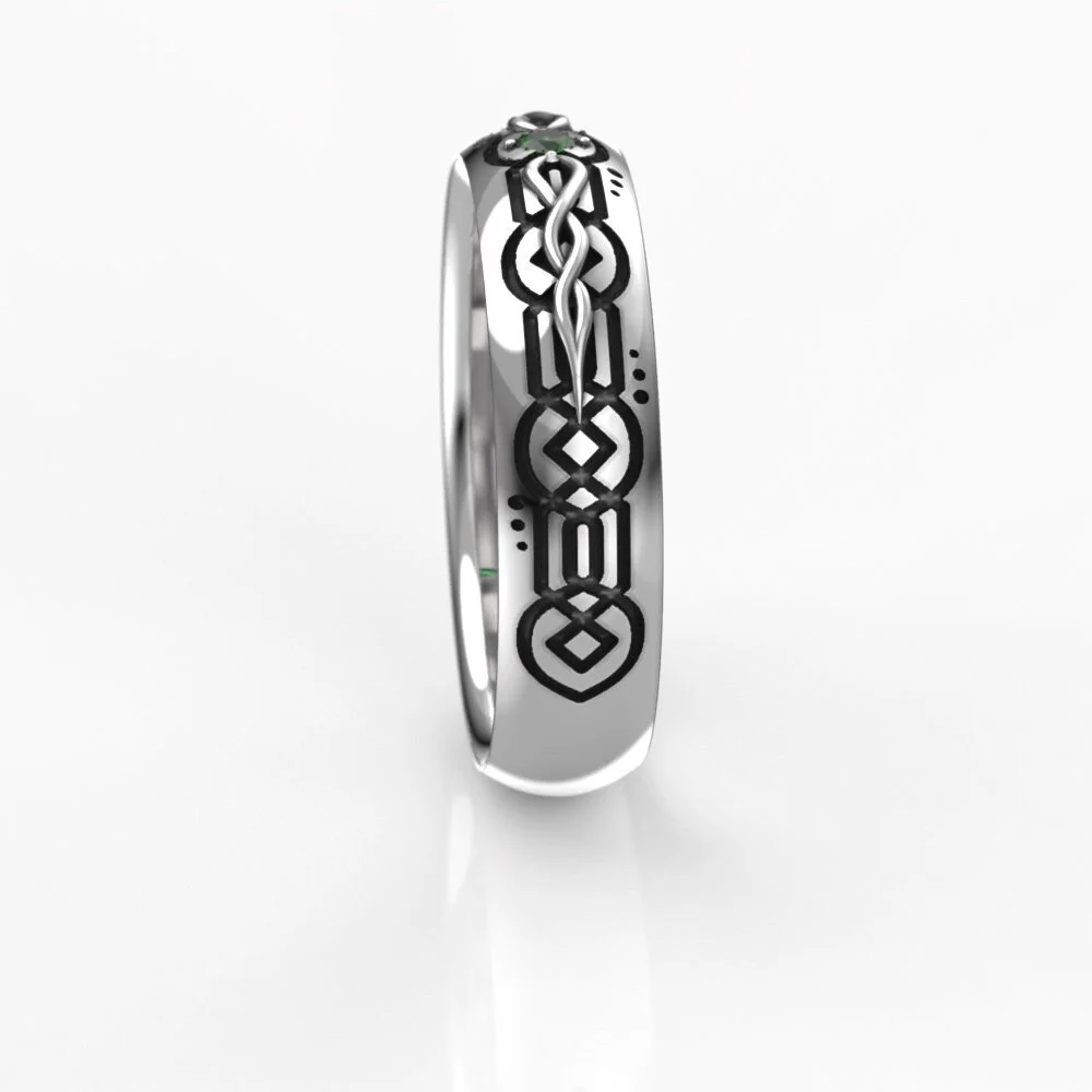 05-celtic-emerald-wedding-band-three-quarter.jpg