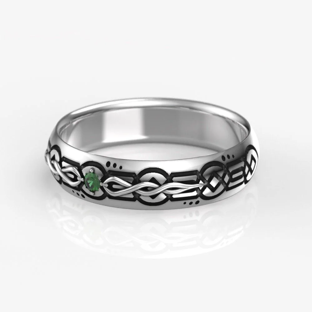 07-celtic-emerald-wedding-band-worn.jpg