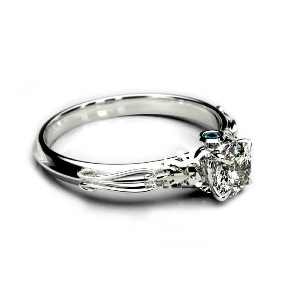 Geeky 4 Claw Triforce Ring - Zelda Inspired Ring with certified Moissanite and Blue Diamond