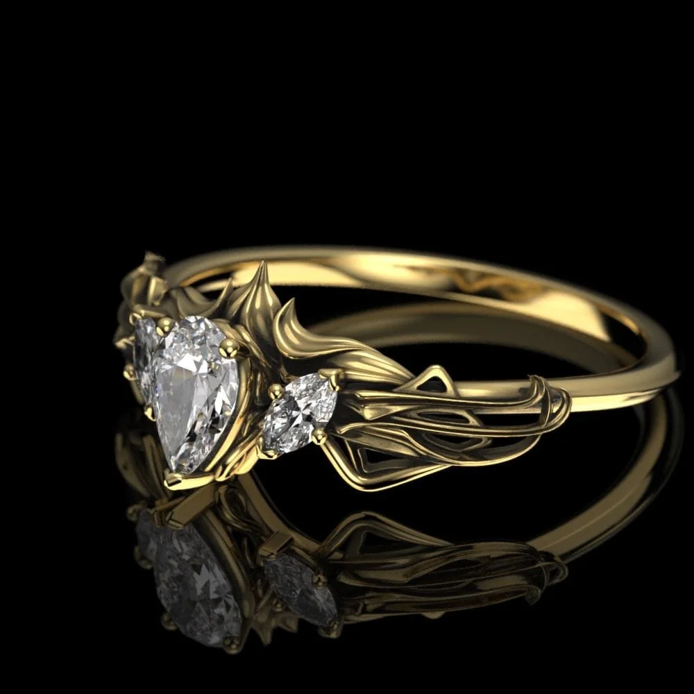 02-gold-art-nouveau-pear-moissanite-engagem-angle.jpg