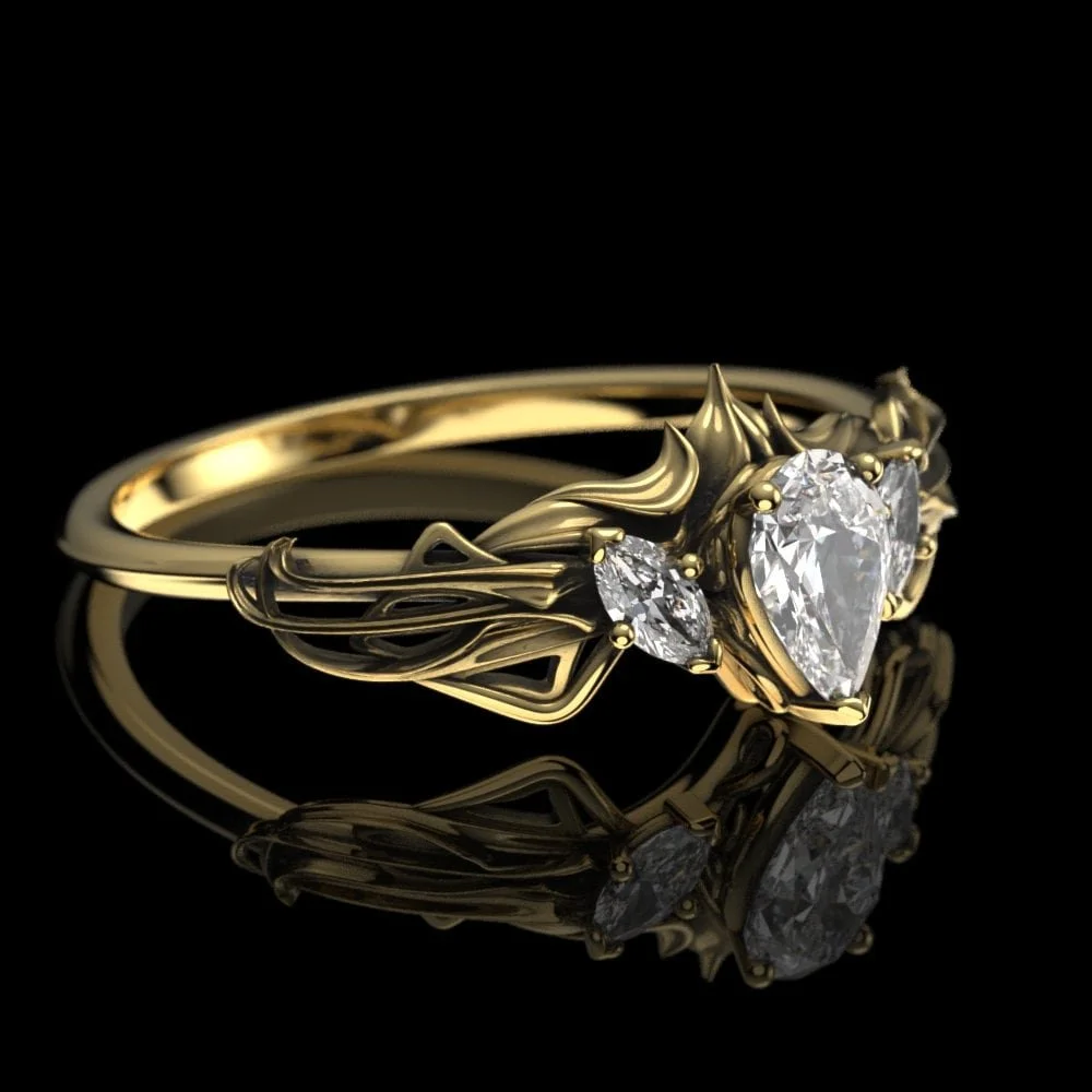 03-gold-art-nouveau-pear-moissanite-engagem-detail.jpg