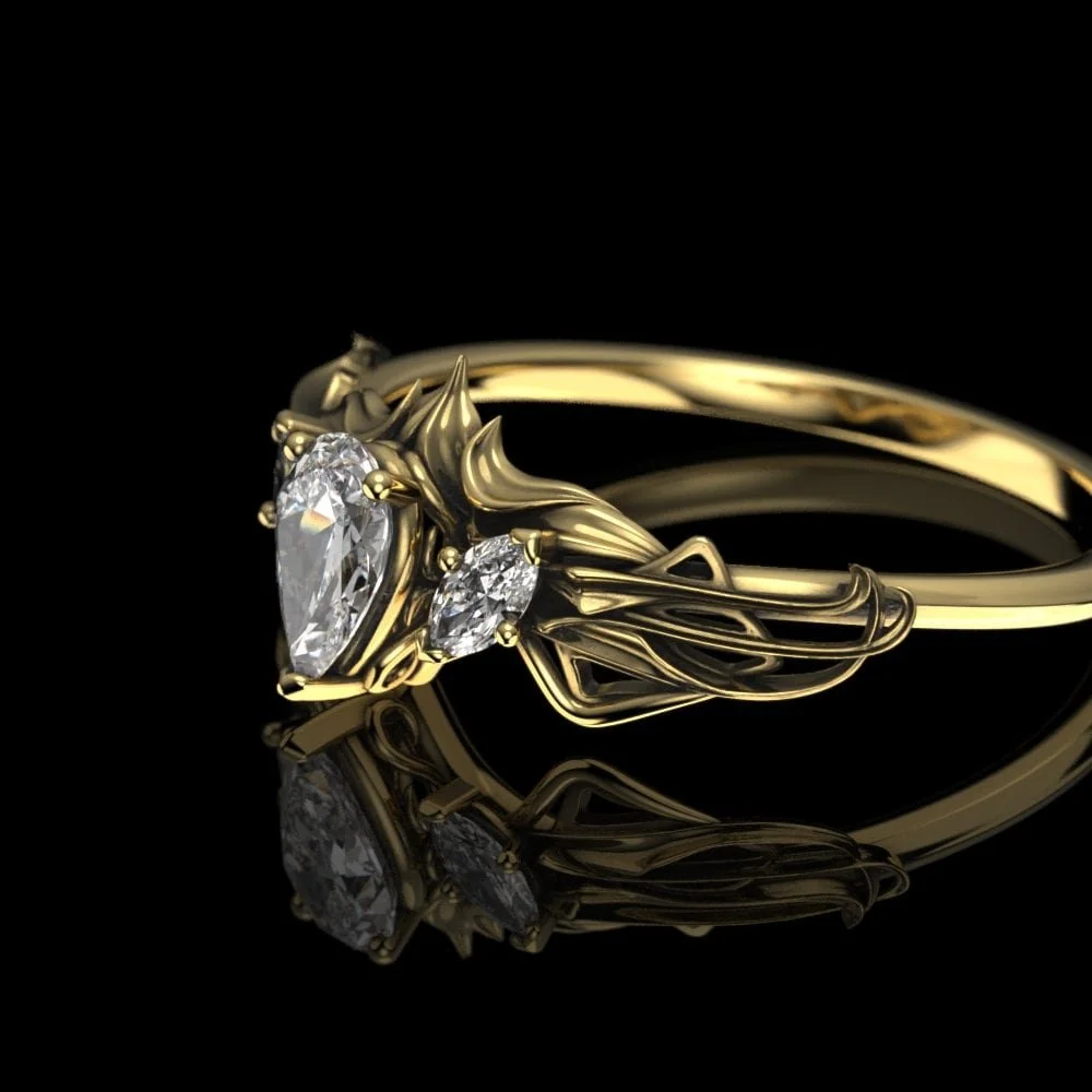 05-gold-art-nouveau-pear-moissanite-engagem-three-quarter.jpg