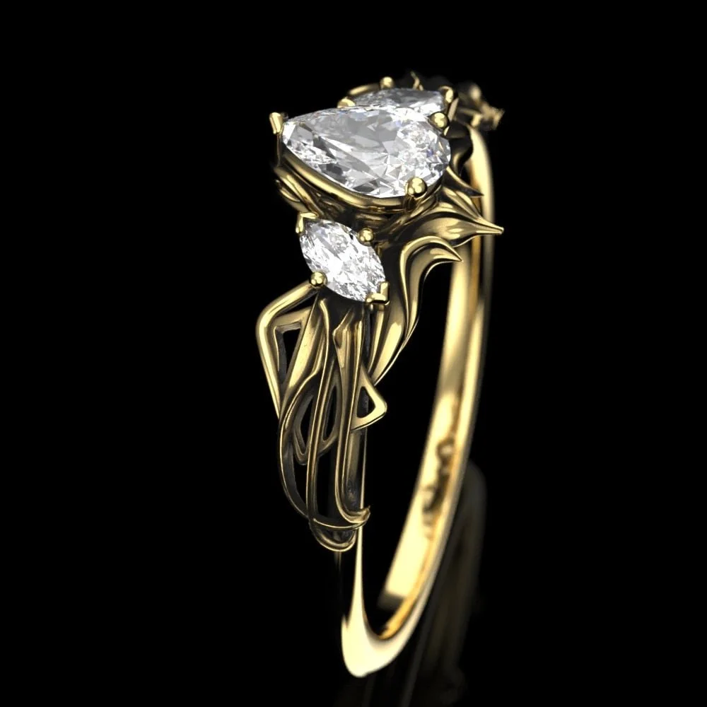 07-gold-art-nouveau-pear-moissanite-engagem-lifestyle.jpg