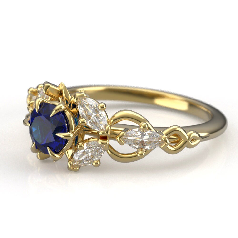 02-gold-elven-engagement-ring-lab-sapphire-angle.jpg