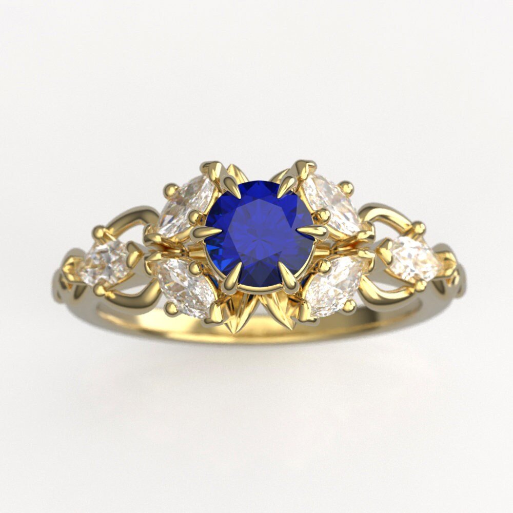 06-gold-elven-engagement-ring-lab-sapphire-worn.jpg