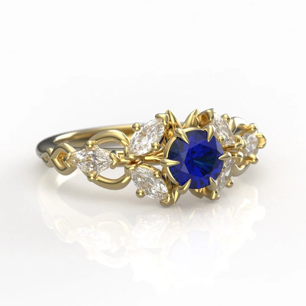 05-gold-elven-engagement-ring-lab-sapphire-three-quarter.jpg