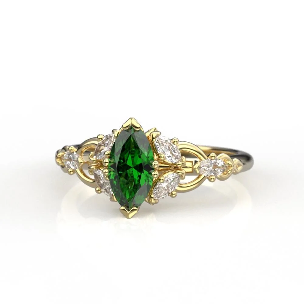 06-gold-elvish-engagement-ring-lab-emerald-worn.jpg