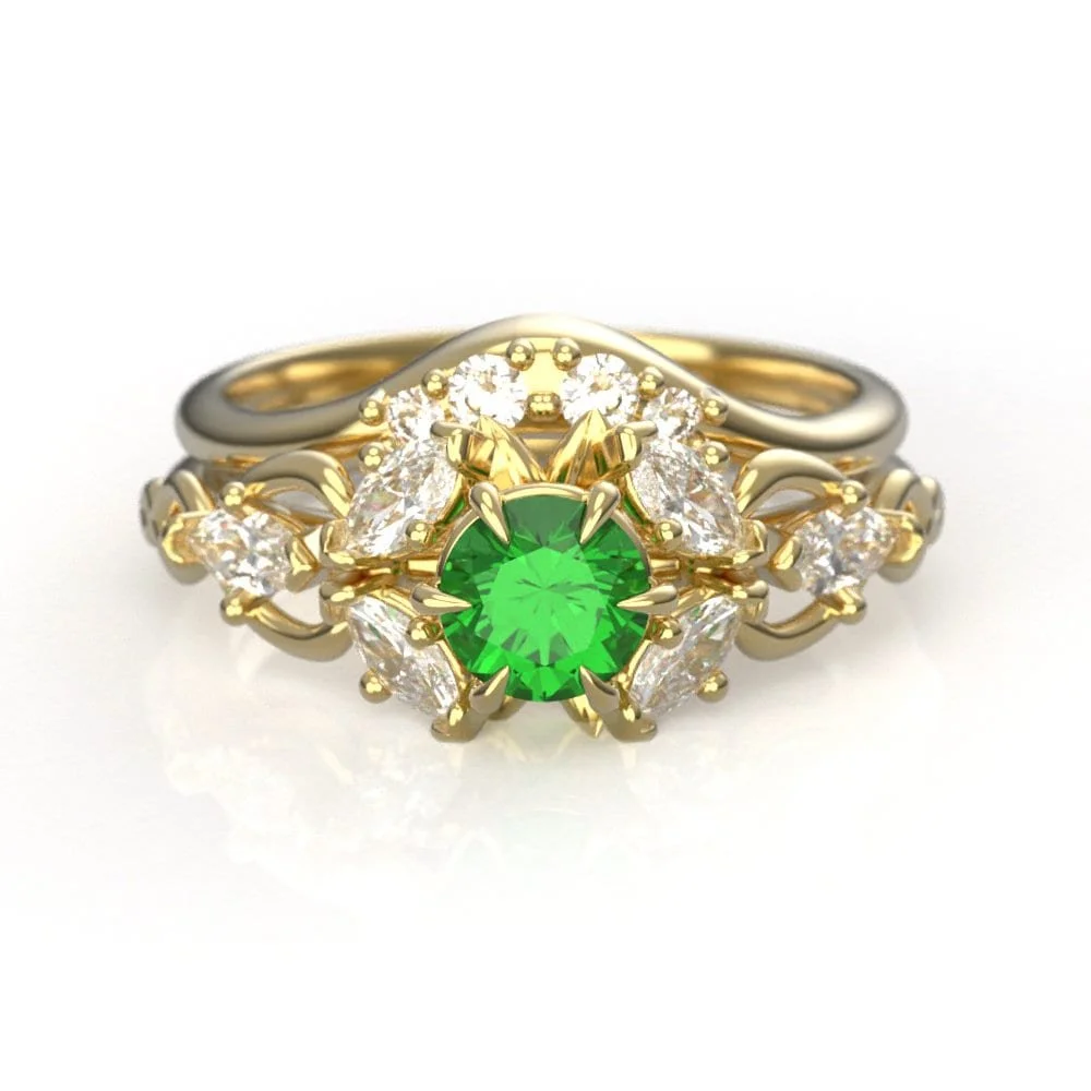 02-gold-elvish-engagement-ring-set-lab-emer-angle.jpg