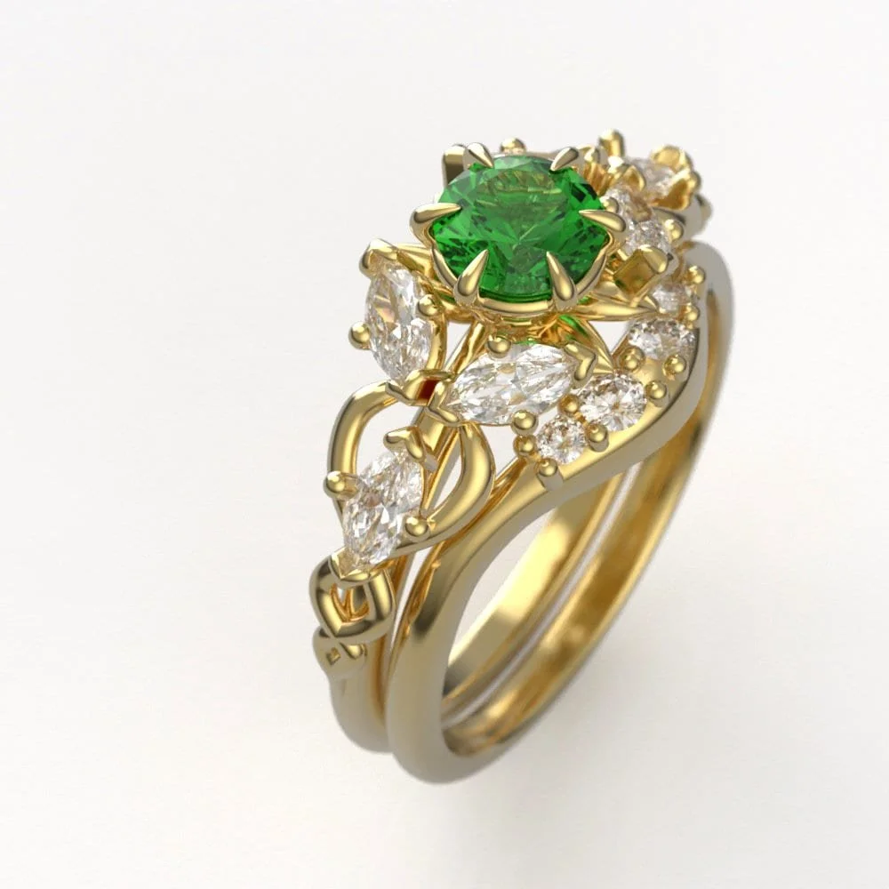 06-gold-elvish-engagement-ring-set-lab-emer-worn.jpg