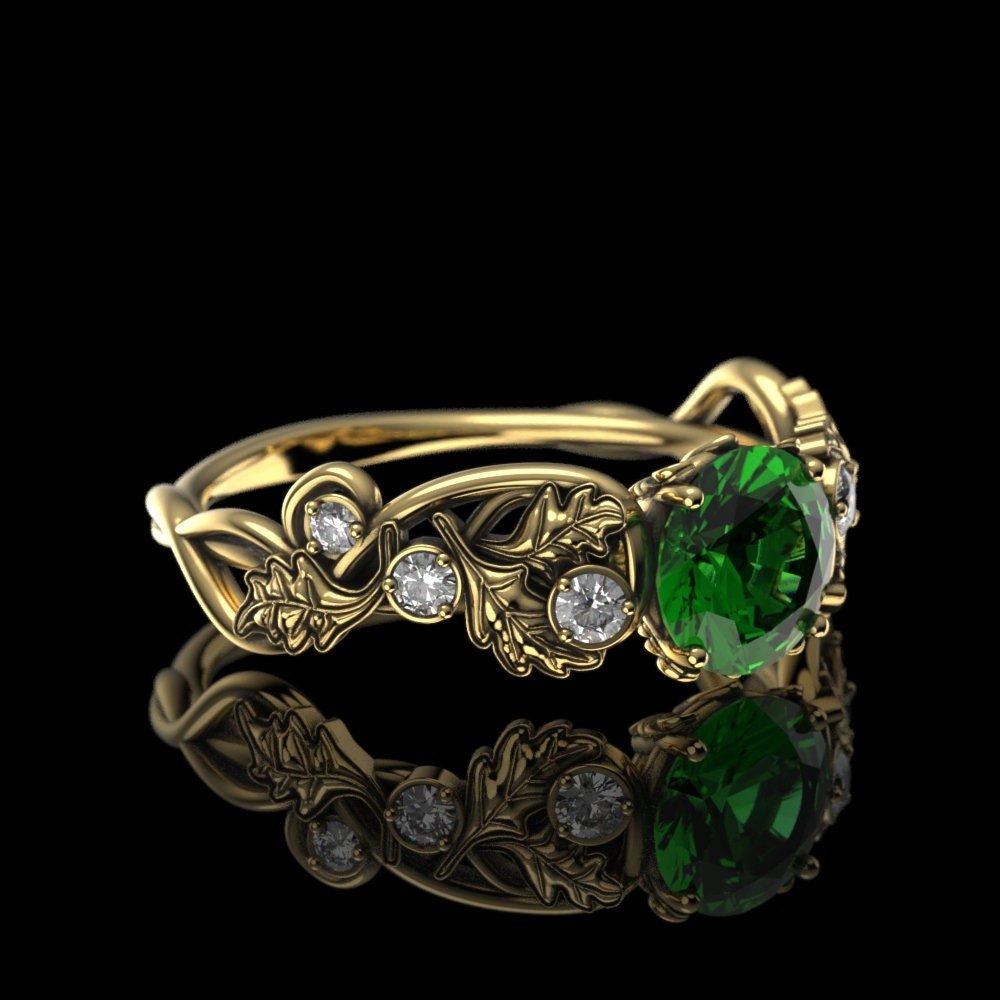 05-gold-lab-emerald-engagement-ring-art-nou-three-quarter.jpg