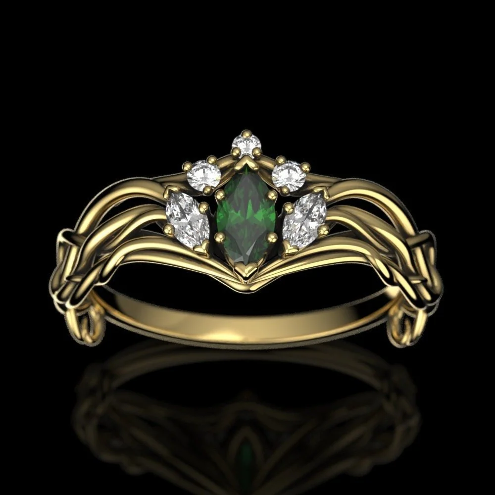02-gold-lab-emerald-engagement-ring-elven-c-angle.jpg