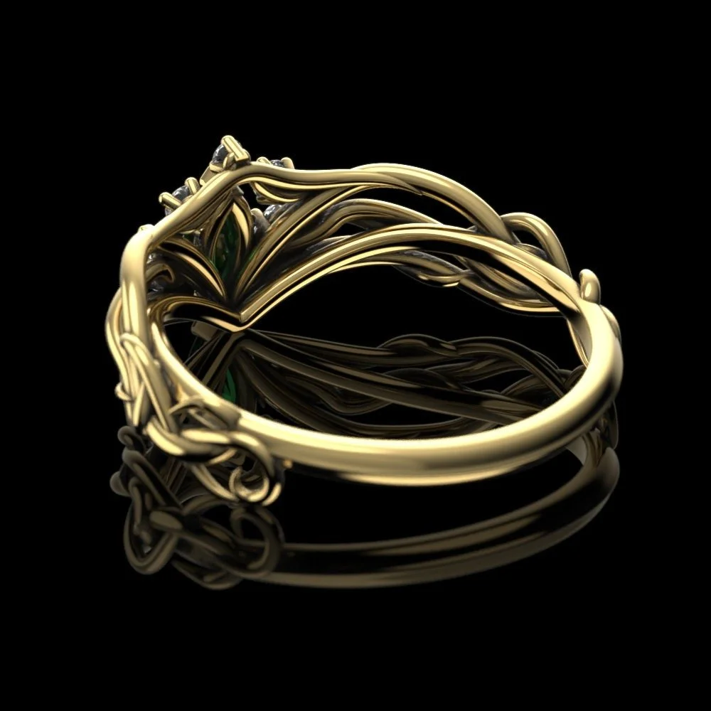 09-gold-lab-emerald-engagement-ring-elven-c-alternate.jpg
