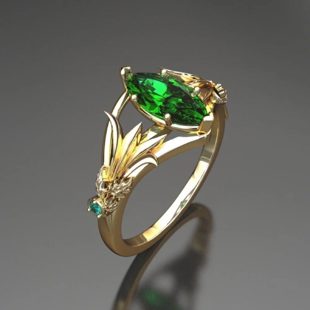 02-gold-leaf-lab-emerald-engagement-ring-el-angle.jpg