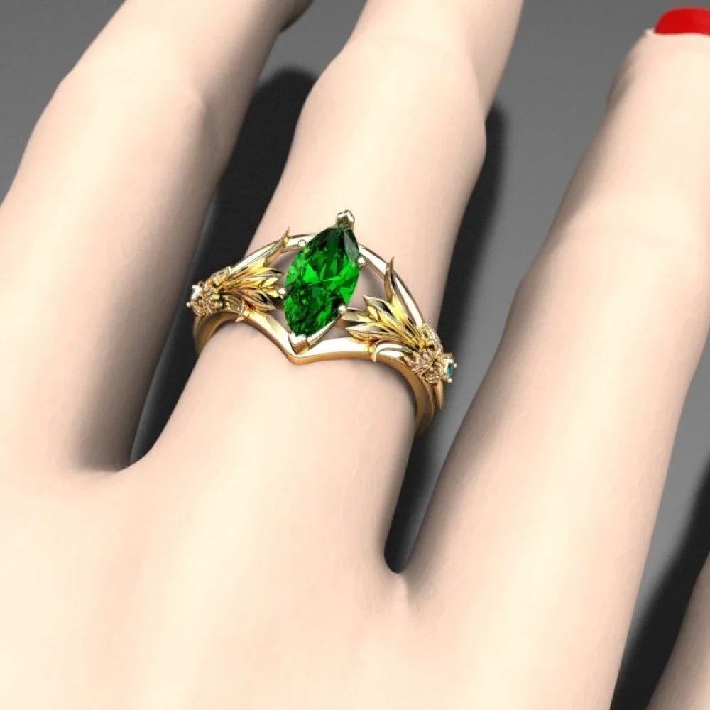 10-gold-leaf-lab-emerald-engagement-ring-el-scale.jpg