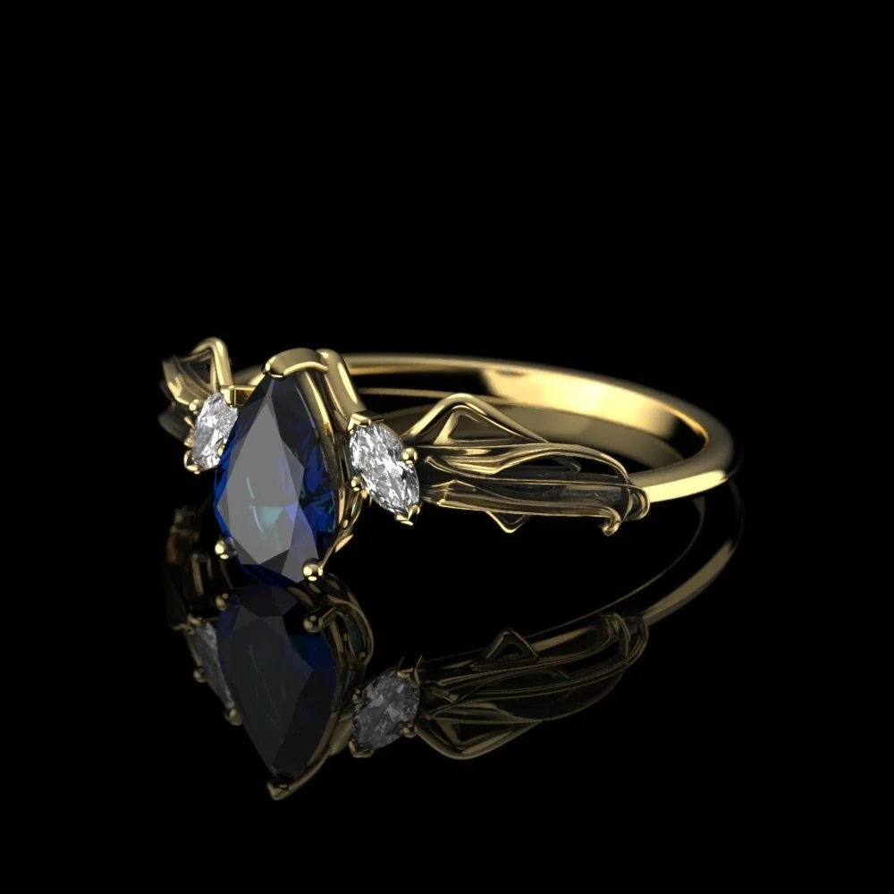 02-gold-pear-cut-lab-sapphire-engagement-ri-angle.jpg