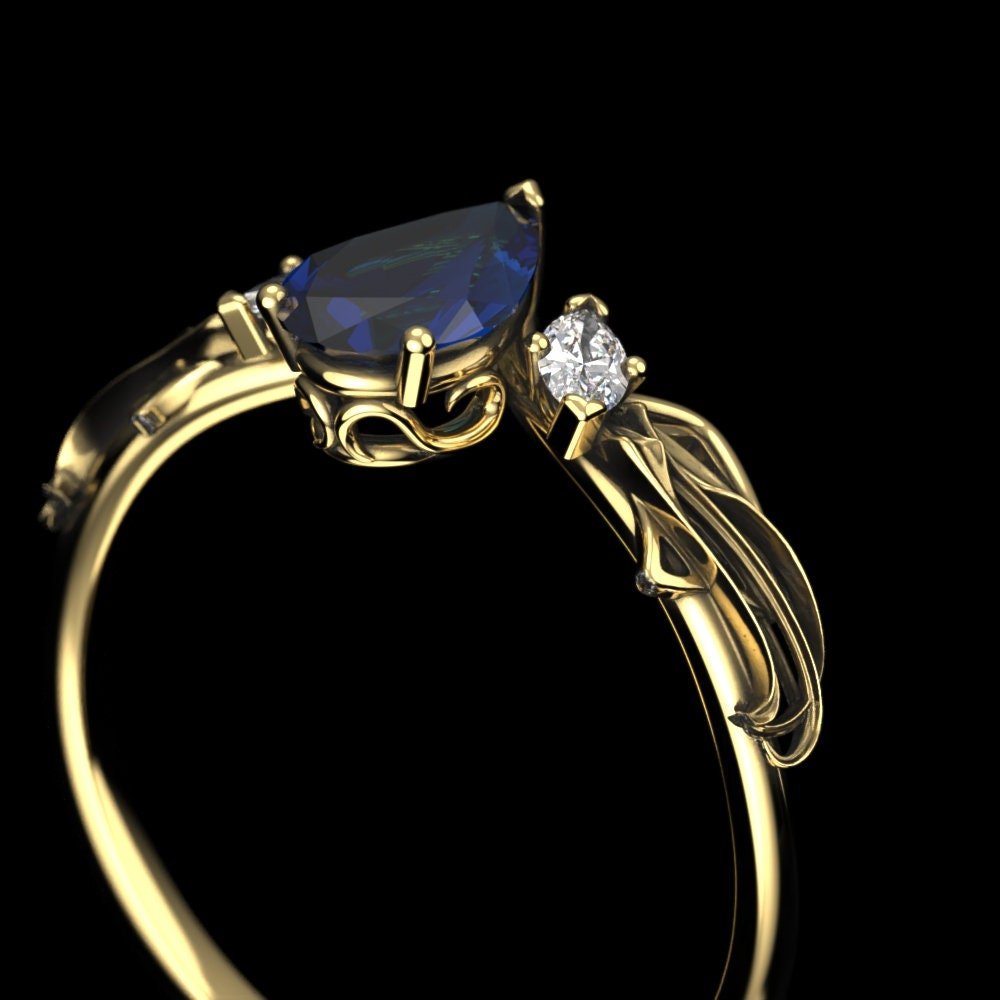 04-gold-pear-cut-lab-sapphire-engagement-ri-side.jpg