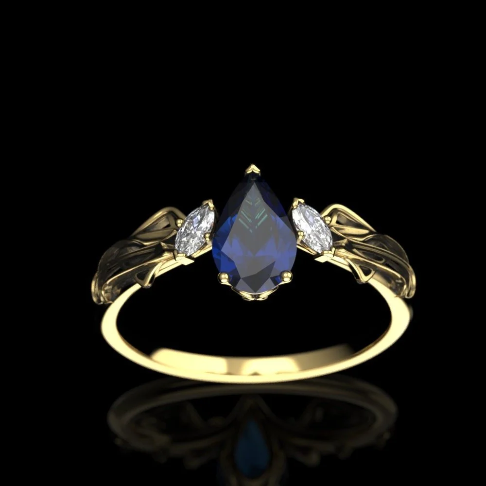 06-gold-pear-cut-lab-sapphire-engagement-ri-worn.jpg