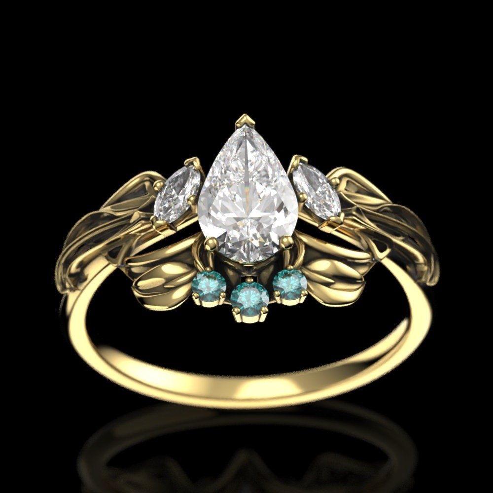 04-gold-pear-moissanite-elven-crown-ring-ar-side.jpg