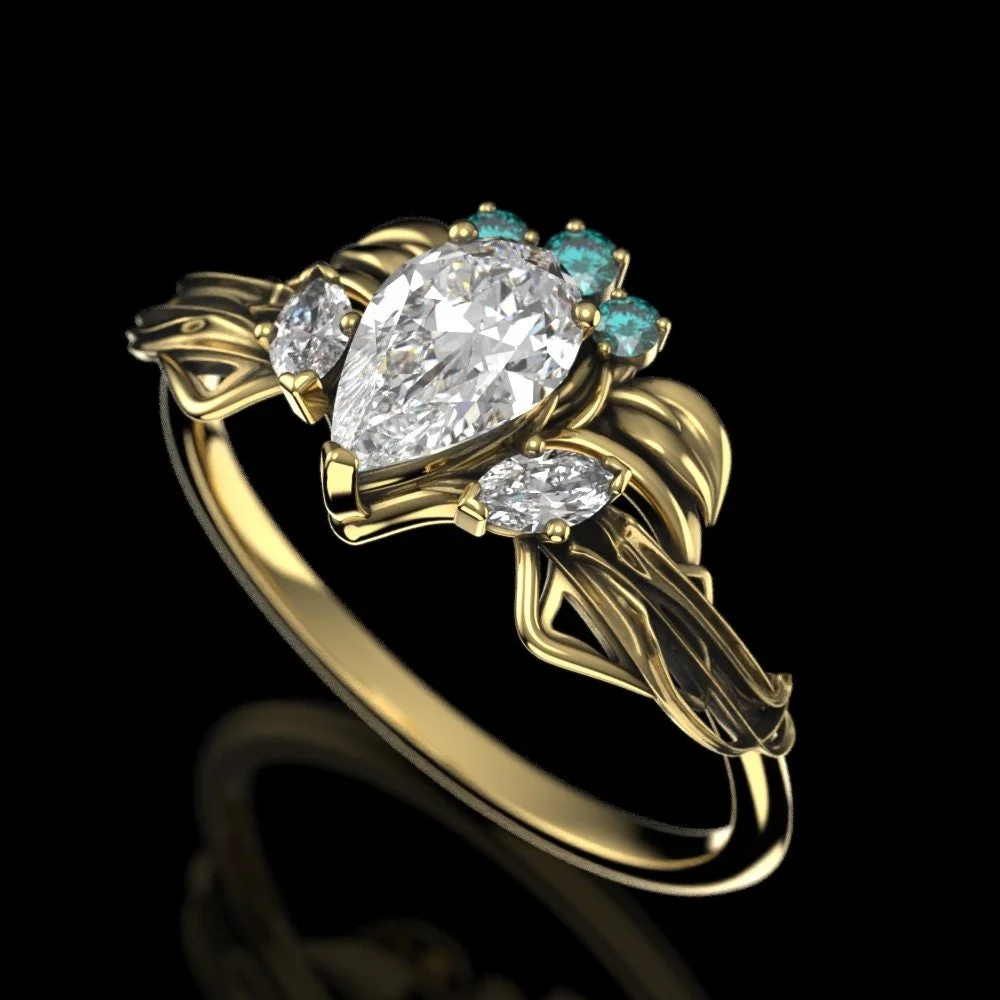06-gold-pear-moissanite-elven-crown-ring-ar-worn.jpg