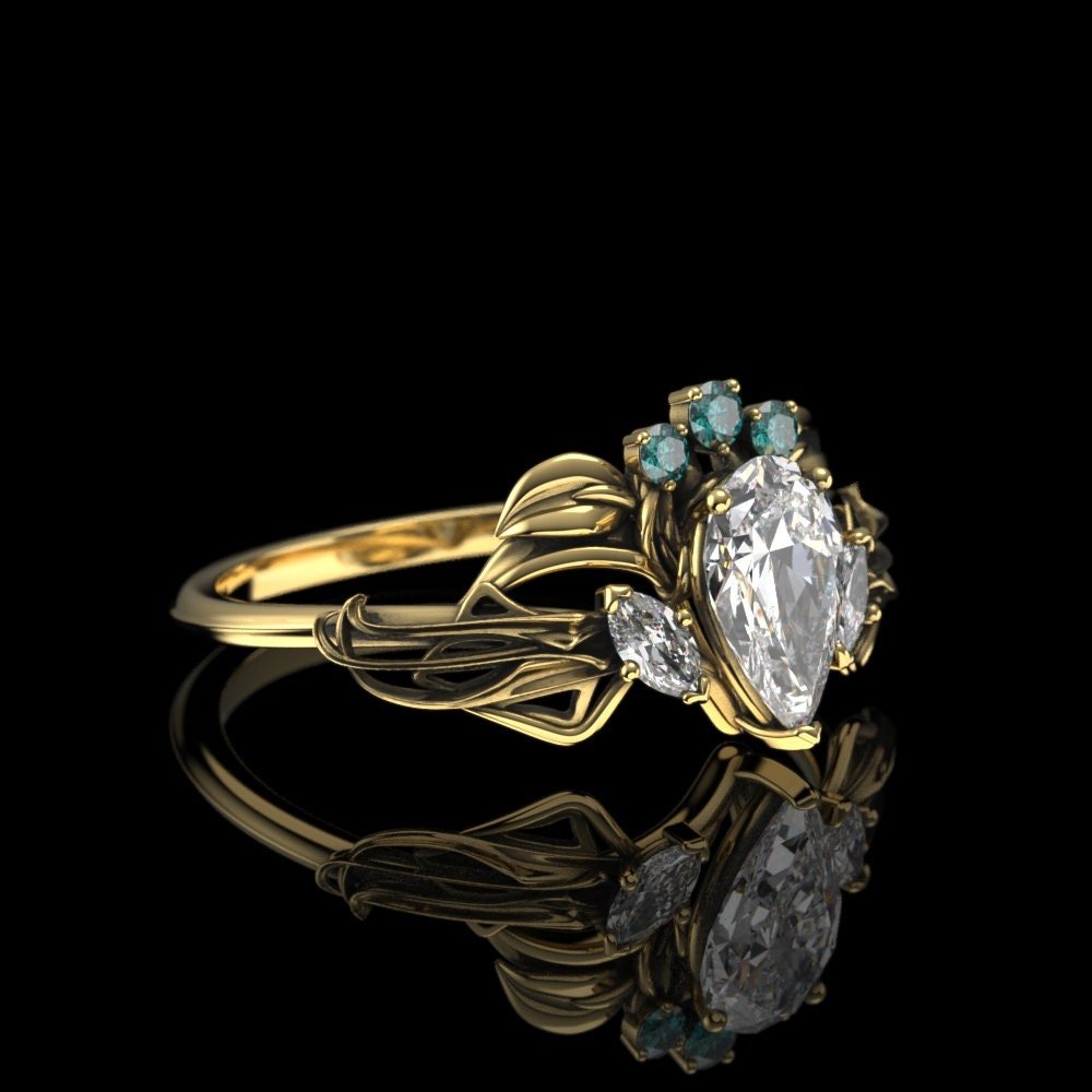 07-gold-pear-moissanite-elven-crown-ring-ar-lifestyle.jpg