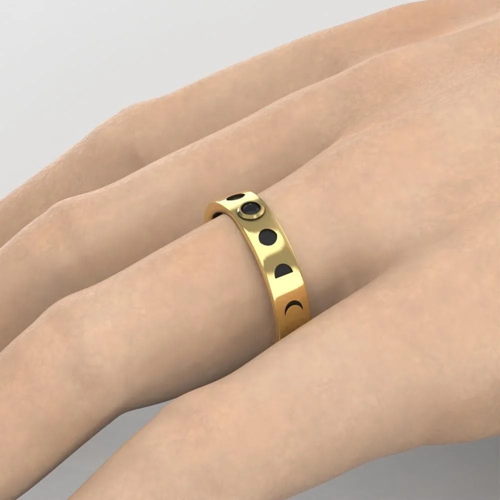 gold-moon-phase-black-diamond-ring-worn.jpg