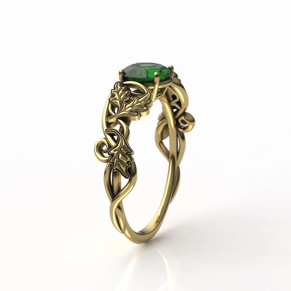 gold-oak-leaf-emerald-engagement-ring-side.jpg