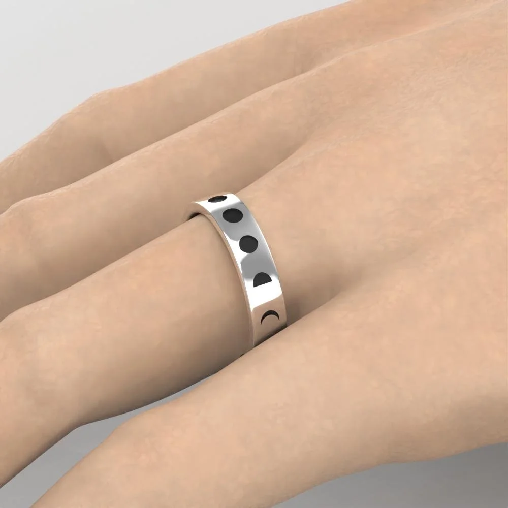 silver-moon-phase-ring-worn-on-hand.jpg