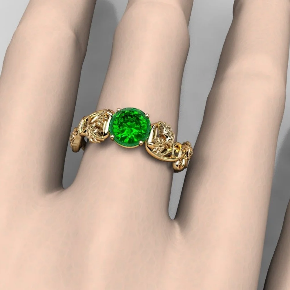 gold-oak-leaf-emerald-ring-worn-on-hand.jpg